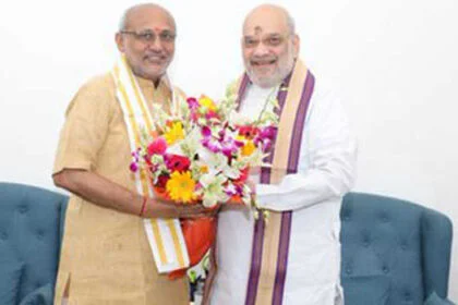 शाह ने सीपी राधाकृष्ण से की मुलाकात