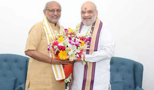 शाह ने सीपी राधाकृष्ण से की मुलाकात